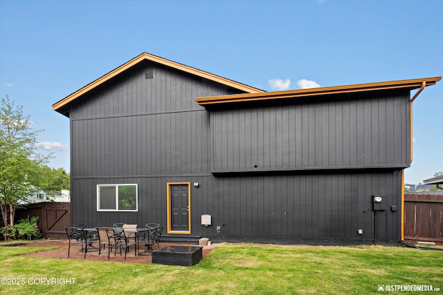 800 Howard Cir, Anchorage, AK 99504 - back of house featuring a patio area