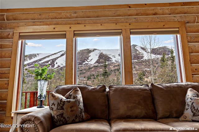 3915 Hiland Rd, Eagle River, AK 99577 - living room featuring rustic walls and a mountain view