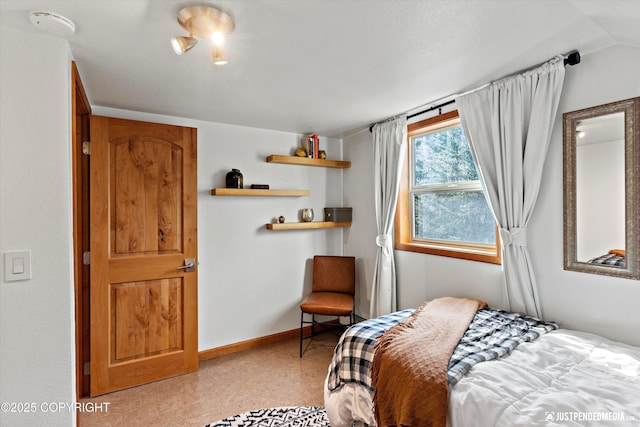 3915 Hiland Rd, Eagle River, AK 99577 - bedroom featuring baseboards
