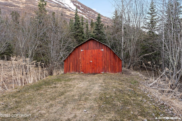 3915 Hiland Rd, Eagle River, AK 99577 - view of outdoor structure featuring an outdoor structure and a mountain view