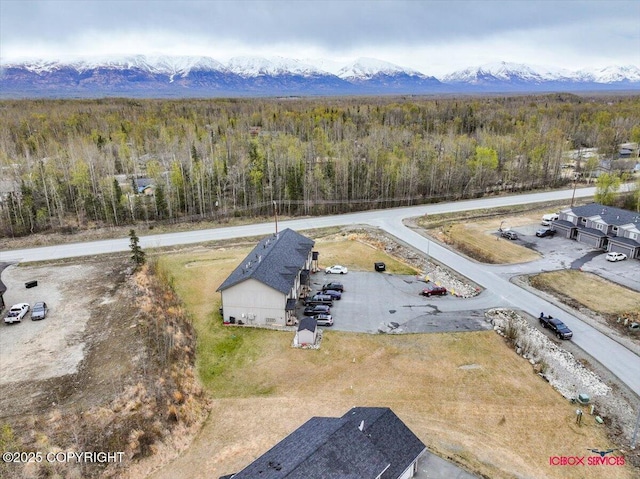 aerial view with a wooded view