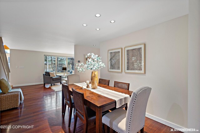 dining space with baseboards, recessed lighting, and dark wood-type flooring