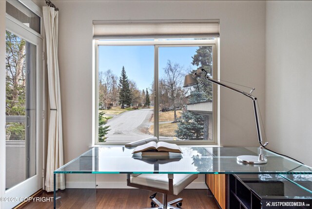 home office with dark wood finished floors