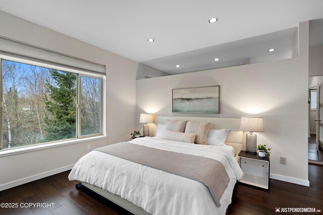 bedroom featuring baseboards, recessed lighting, and wood finished floors