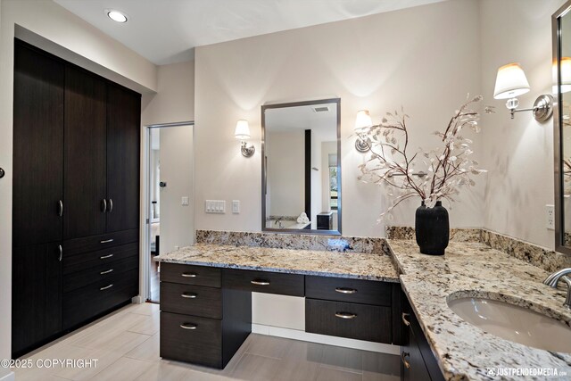 full bathroom featuring vanity