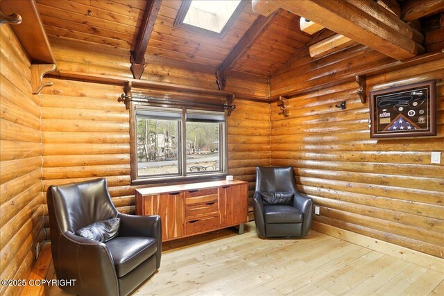 17720 Werre St, Chugiak, AK 99567 - sitting room featuring light wood-style floors, wooden ceiling, a skylight, and log walls