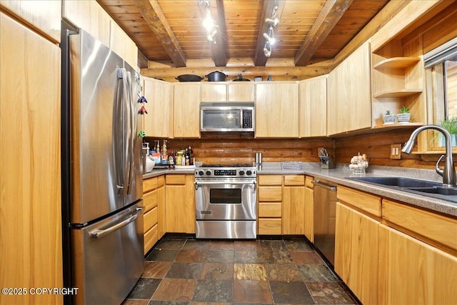 17720 Werre St, Chugiak, AK 99567 - kitchen featuring stainless steel appliances, a sink, wood ceiling, dark stone finish floors, and light brown cabinetry