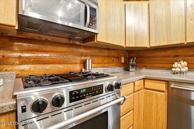 17720 Werre St, Chugiak, AK 99567 - kitchen with stainless steel appliances and light brown cabinetry