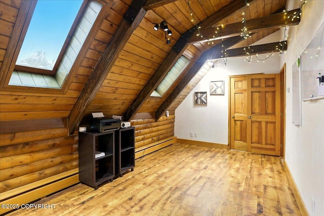 17720 Werre St, Chugiak, AK 99567 - bonus room featuring wood ceiling, a skylight, a baseboard radiator, wood-type flooring, and baseboards