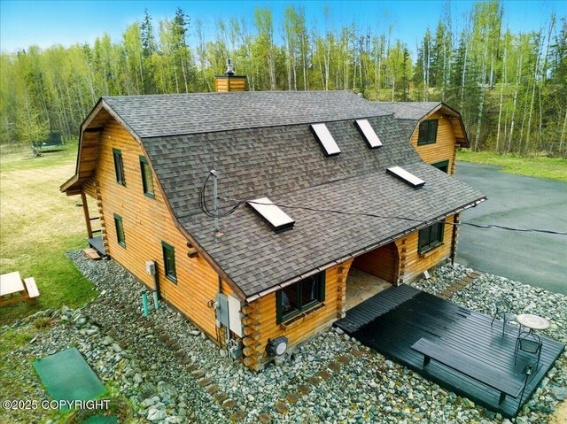 17720 Werre St, Chugiak, AK 99567 - aerial view of property and surrounding area with a heavily wooded area