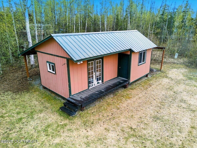 17720 Werre St, Chugiak, AK 99567 - view of outbuilding featuring french doors and a forest view