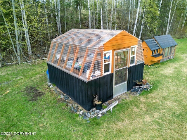 17720 Werre St, Chugiak, AK 99567 - view of greenhouse with a lawn and exterior structure