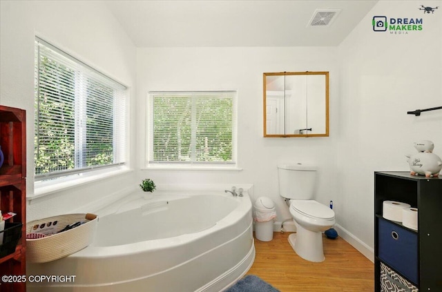 1900 N Green Forest Dr, Palmer, AK 99645 - bathroom with wood finished floors and a garden tub