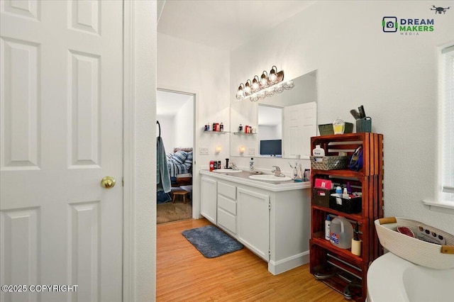 1900 N Green Forest Dr, Palmer, AK 99645 - full bath featuring wood finished floors and double vanity