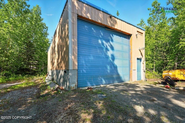 1900 N Green Forest Dr, Palmer, AK 99645 - view of home's exterior featuring an outbuilding and a garage