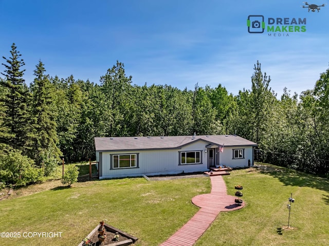 1900 N Green Forest Dr, Palmer, AK 99645 - view of front of home with a front yard and a view of trees