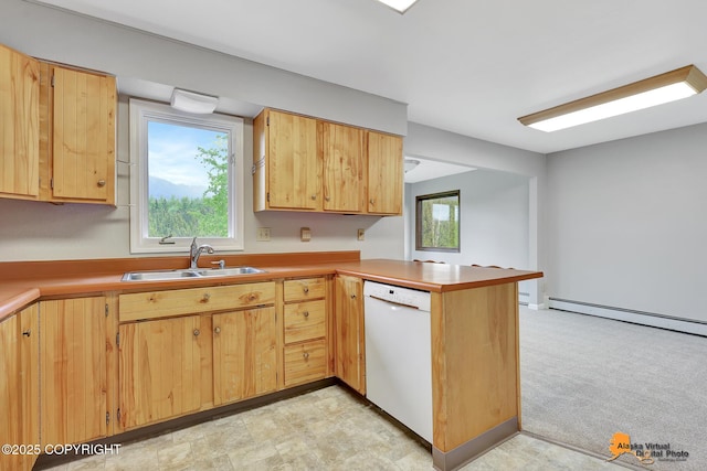 3211 Shamrock St, Anchorage, AK 99504 - kitchen with white dishwasher, a peninsula, light brown cabinetry, and light countertops