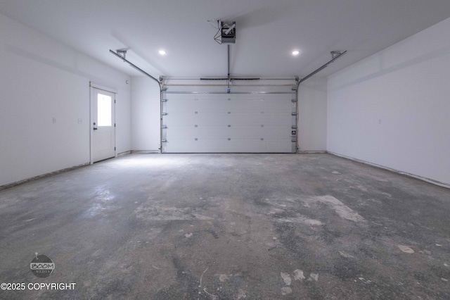 7177 N Paw St, Wasilla, AK 99654 - garage featuring a garage door opener and recessed lighting