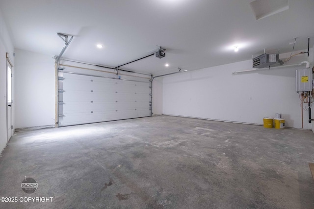7177 N Paw St, Wasilla, AK 99654 - garage with a garage door opener and recessed lighting