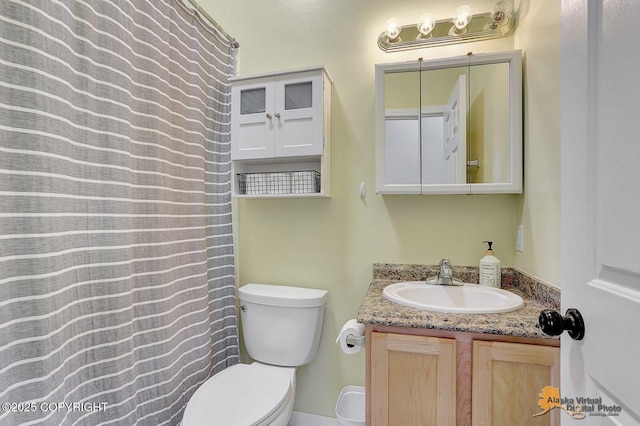 3541 E Wanamingo Dr, Wasilla, AK 99654 - full bathroom featuring toilet, a shower with shower curtain, and vanity
