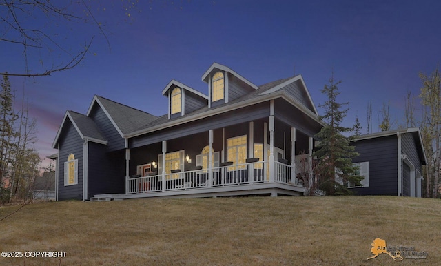 3541 E Wanamingo Dr, Wasilla, AK 99654 - country-style home with covered porch and a front yard