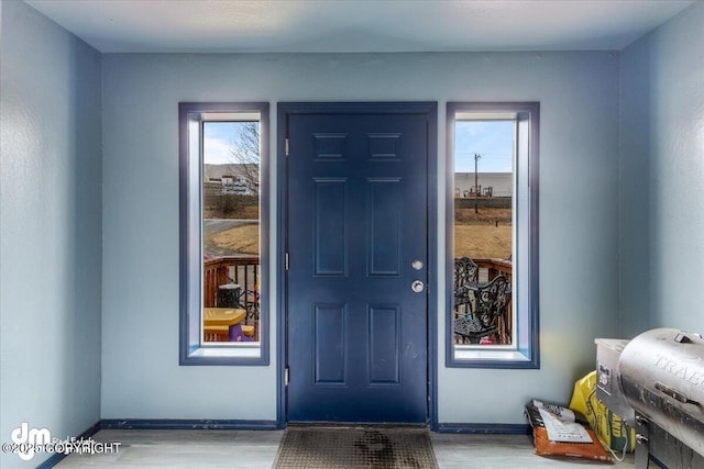2601 E Quiet Cir, Wasilla, AK 99654 - foyer entrance with baseboards and wood finished floors