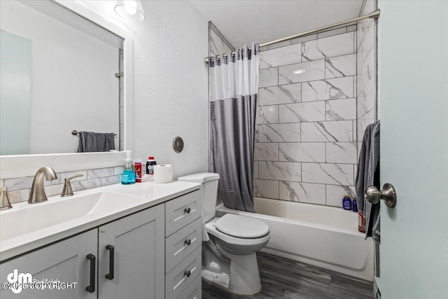 2601 E Quiet Cir, Wasilla, AK 99654 - full bathroom with vanity, shower / tub combo with curtain, wood finished floors, and toilet