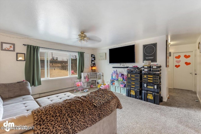 2601 E Quiet Cir, Wasilla, AK 99654 - living area featuring carpet flooring, ceiling fan, and a baseboard radiator
