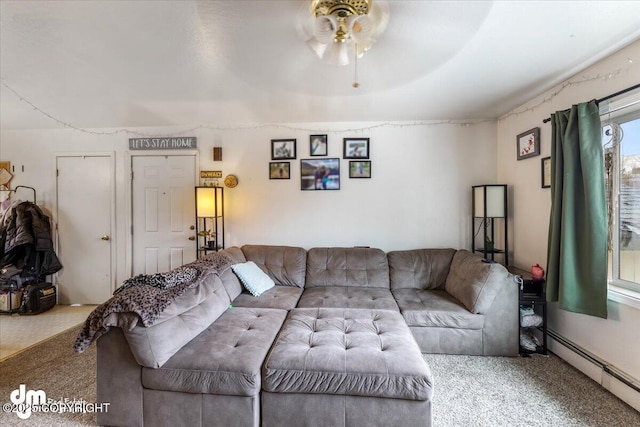2601 E Quiet Cir, Wasilla, AK 99654 - carpeted living area featuring ceiling fan and baseboard heating