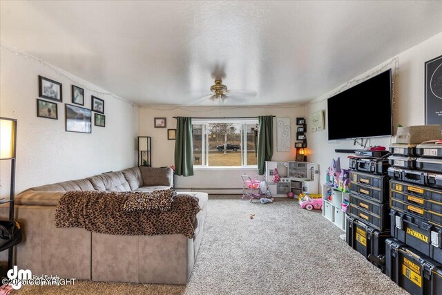 2601 E Quiet Cir, Wasilla, AK 99654 - living area with carpet floors, ceiling fan, and baseboard heating