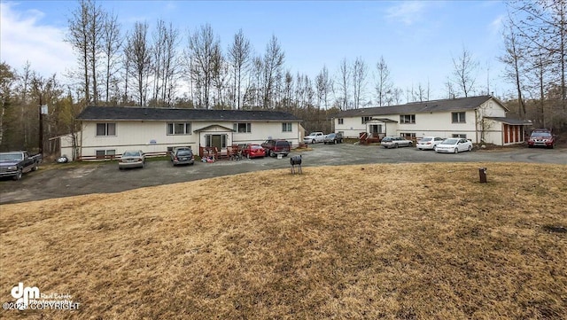 2601 E Quiet Cir, Wasilla, AK 99654 - bi-level home with uncovered parking and a front yard