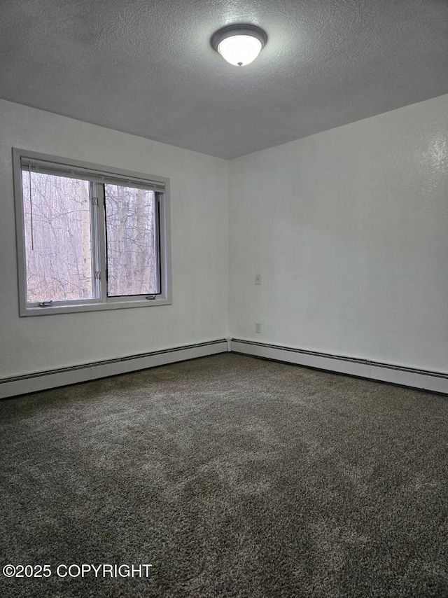 2601 E Quiet Cir, Wasilla, AK 99654 - carpeted spare room featuring a textured ceiling