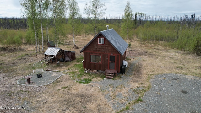view of front facade featuring metal roof