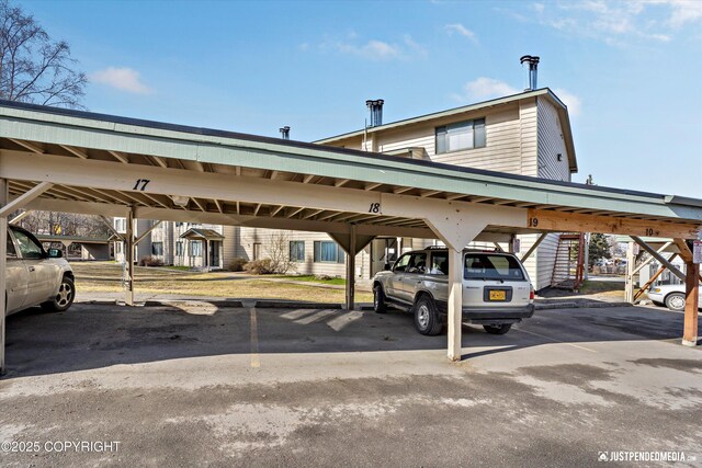 355 Donna Dr # 18, Anchorage, AK 99504 - view of covered parking lot