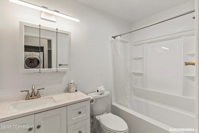355 Donna Dr # 18, Anchorage, AK 99504 - bathroom with shower / bath combo with shower curtain, stacked washer and dryer, toilet, and vanity