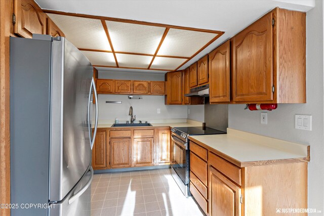 355 Donna Dr # 18, Anchorage, AK 99504 - kitchen with a sink, stainless steel appliances, light countertops, under cabinet range hood, and brown cabinetry