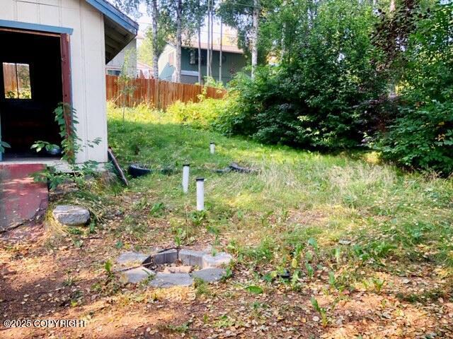 view of yard with fence