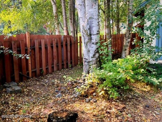 view of yard with fence