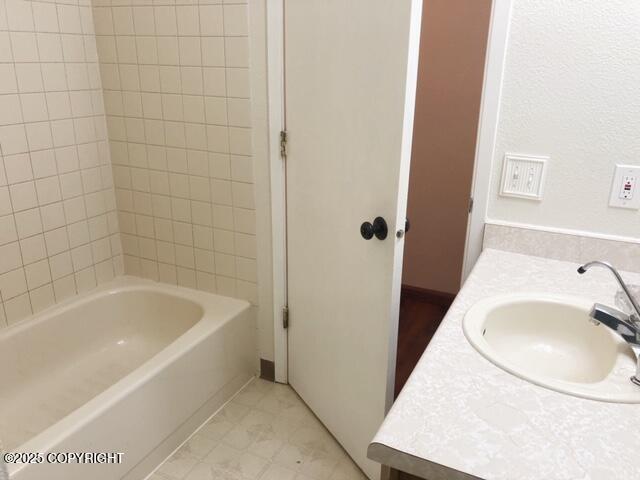 full bathroom featuring vanity