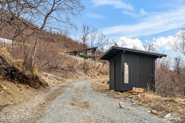 view of street featuring driveway