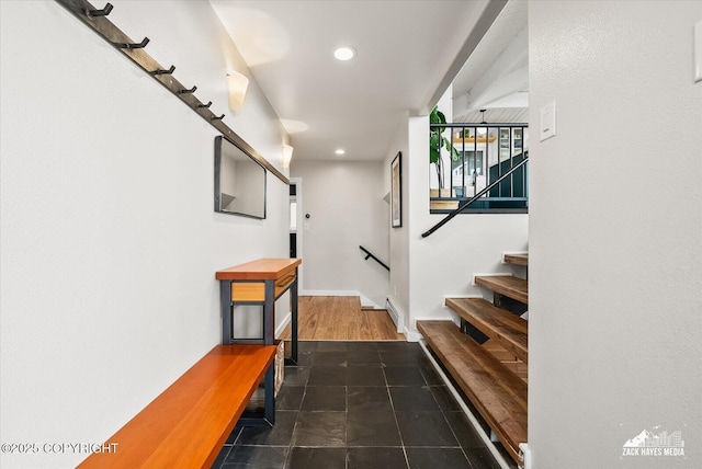 interior space featuring recessed lighting, baseboards, and tile patterned floors