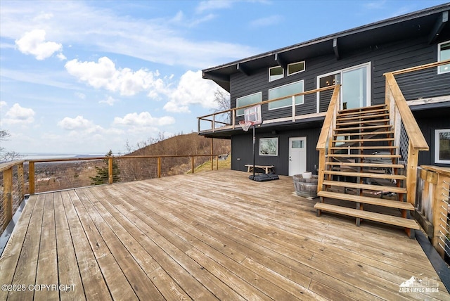 wooden deck featuring stairway
