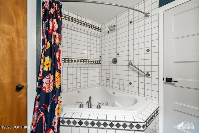 full bath featuring a combined bath / shower with jetted tub and tile walls