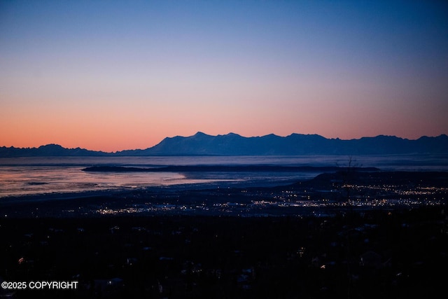 mountain view featuring a water view