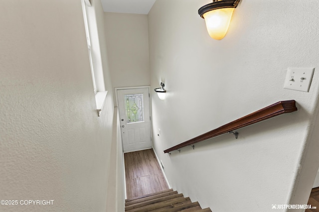 243 Creekside St # 2, Anchorage, AK 99504 - stairs featuring wood finished floors and baseboards