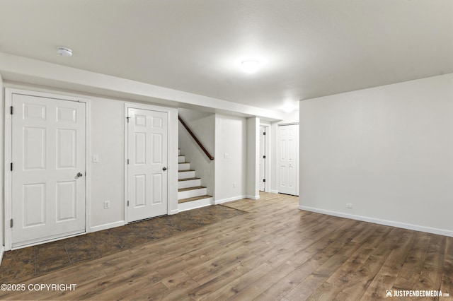 243 Creekside St # 2, Anchorage, AK 99504 - finished basement with wood finished floors, stairs, and baseboards