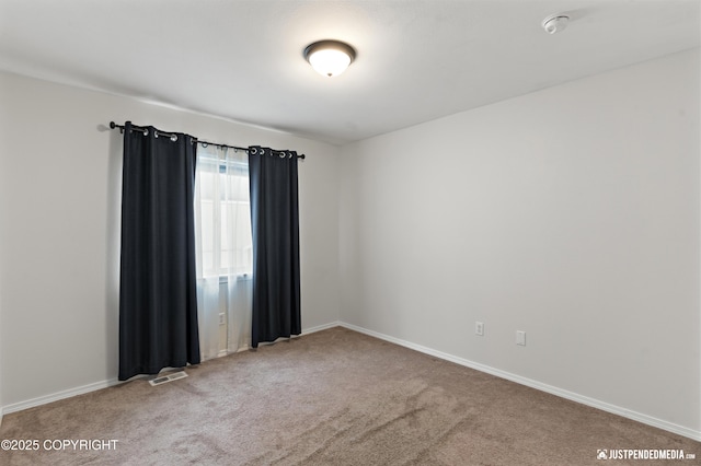 243 Creekside St # 2, Anchorage, AK 99504 - carpeted empty room with baseboards