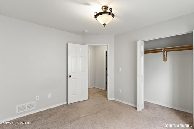 243 Creekside St # 2, Anchorage, AK 99504 - unfurnished bedroom featuring carpet floors, a closet, and baseboards
