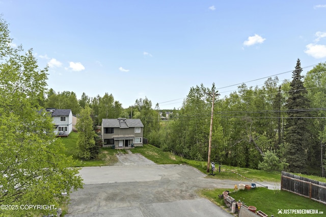 243 Creekside St # 2, Anchorage, AK 99504 - view of front facade featuring a front lawn