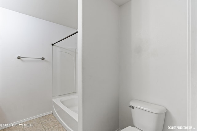 243 Creekside St # 2, Anchorage, AK 99504 - full bath with toilet, shower / washtub combination, baseboards, and tile patterned flooring